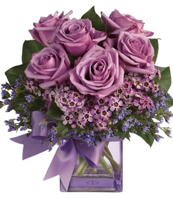 Purple Flowers In Purple Glass Cube Vase
